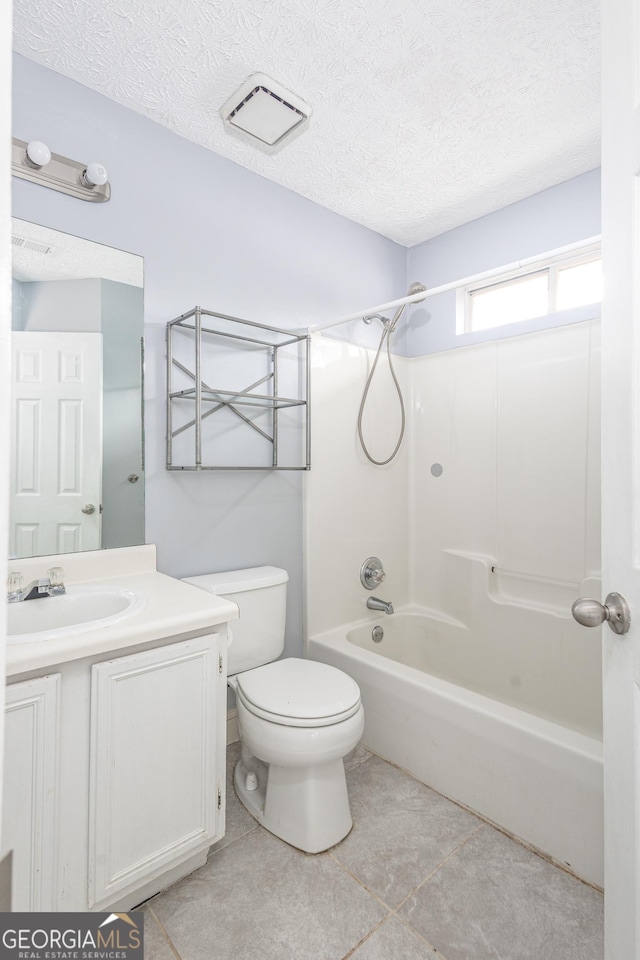 full bath with visible vents, toilet, a textured ceiling, shower / tub combination, and vanity