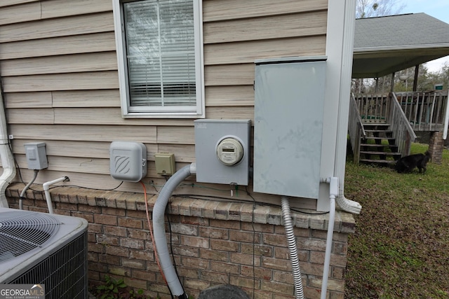 details featuring central AC unit and electric meter