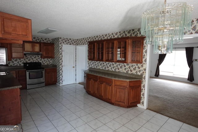 kitchen with wallpapered walls, electric stove, light colored carpet, a textured ceiling, and under cabinet range hood