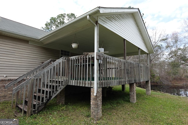 exterior space with stairway and a wooden deck