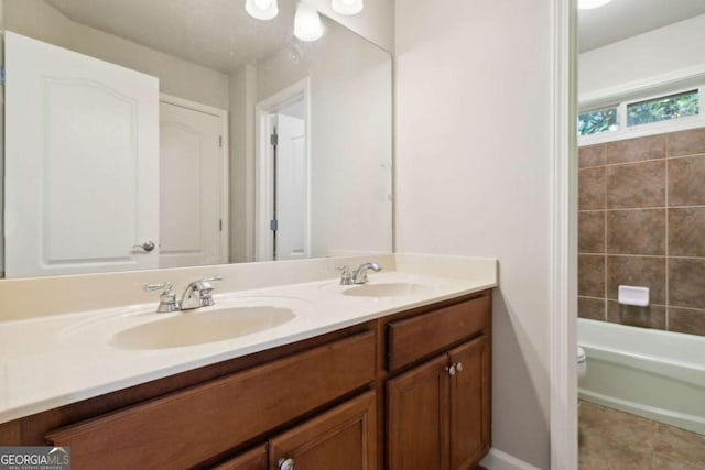 bathroom with walk in shower, a sink, a bathing tub, and double vanity