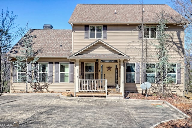 view of front of property with crawl space, a porch, a chimney, and a shingled roof