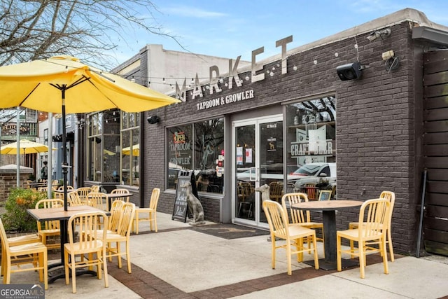 view of patio with outdoor dining space