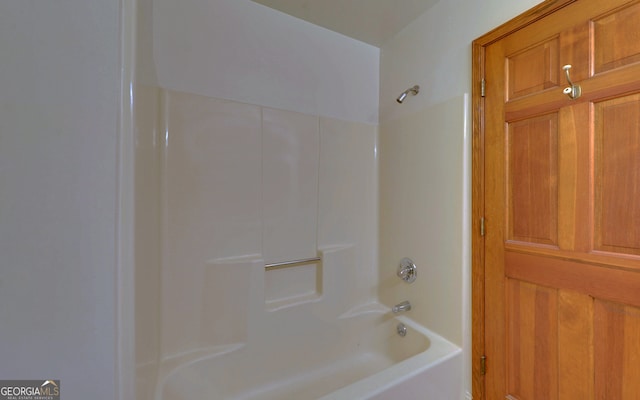 bathroom with shower / washtub combination