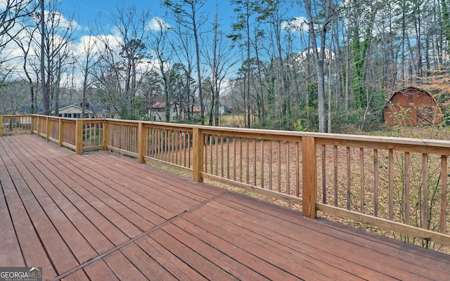 deck with an outdoor structure