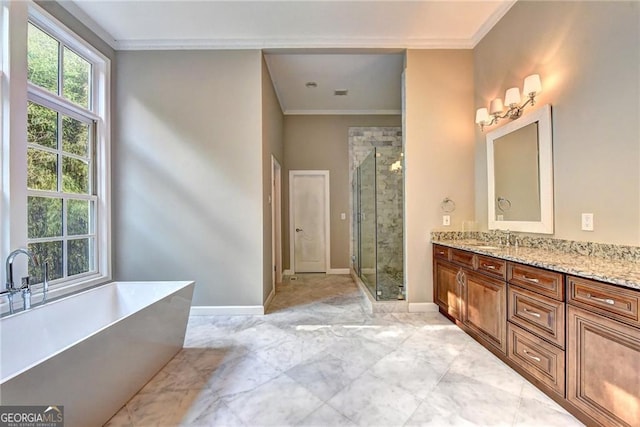 full bathroom featuring a stall shower, crown molding, baseboards, a soaking tub, and vanity