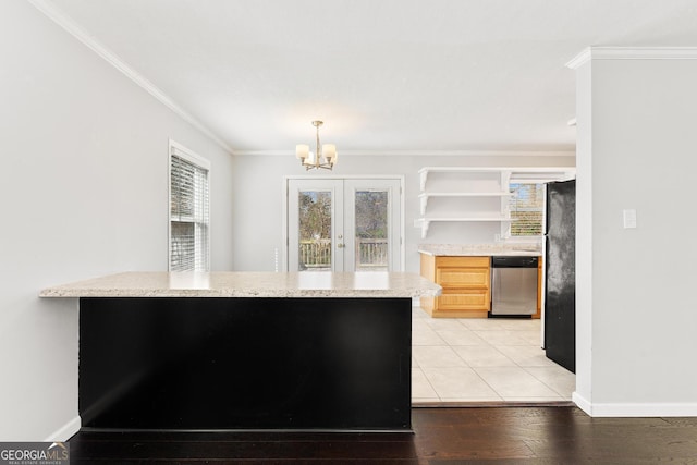 kitchen featuring open shelves, appliances with stainless steel finishes, plenty of natural light, and crown molding