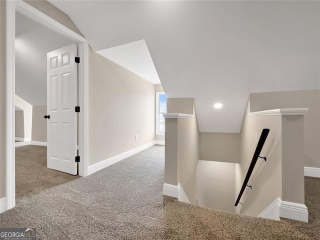 bonus room with lofted ceiling, carpet, and baseboards