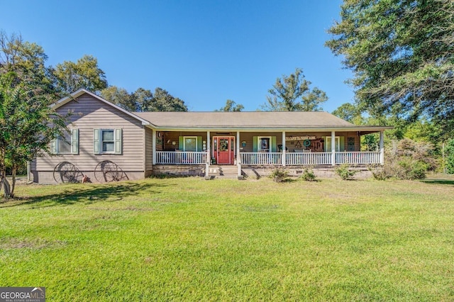 single story home with a porch and a front yard