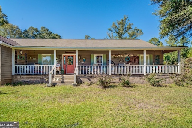 view of front facade featuring a porch and a front yard