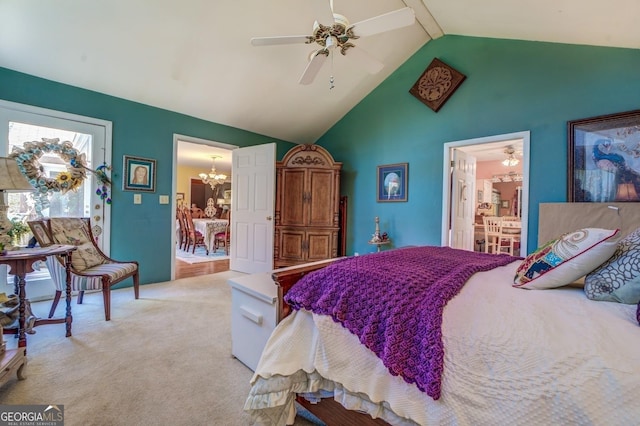 bedroom with light carpet, lofted ceiling with beams, ceiling fan with notable chandelier, and connected bathroom