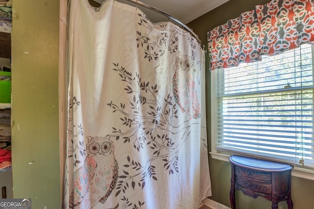 bathroom with curtained shower