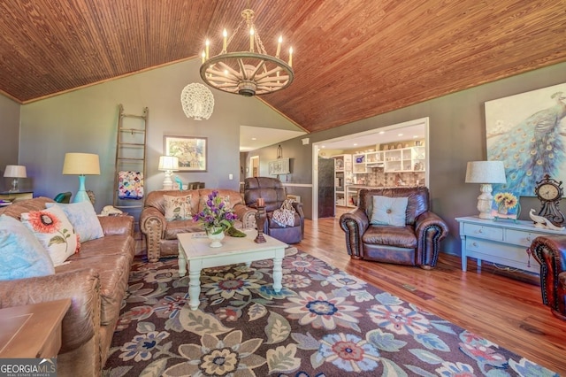 living area featuring lofted ceiling, wooden ceiling, wood finished floors, and a chandelier