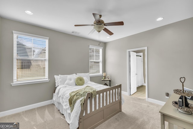 bedroom featuring baseboards, recessed lighting, visible vents, and light colored carpet