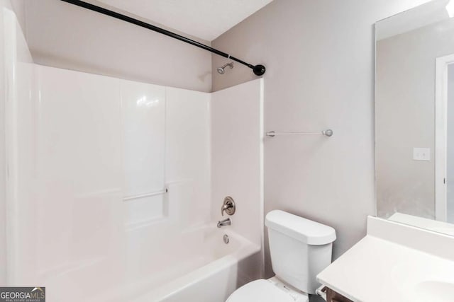 bathroom featuring toilet, shower / bath combination, and vanity