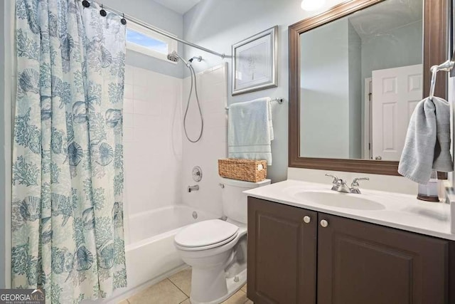 bathroom featuring vanity, shower / bath combination with curtain, toilet, and tile patterned floors