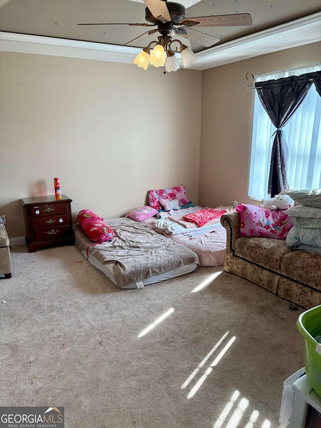 bedroom featuring carpet floors and ceiling fan