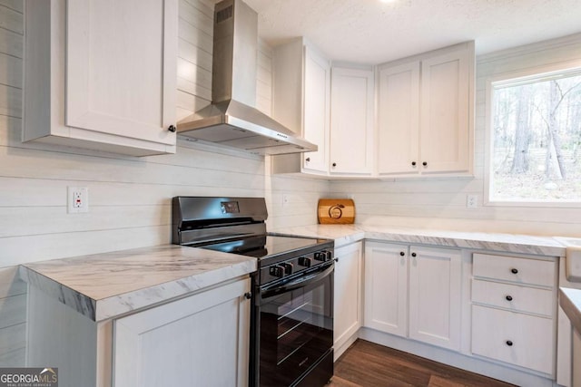 2859 Fortner Rd, Ball Ground, GA 30107 - kitchen featuring electric range, wall chimney exhaust hood, dark wood finished floors, white cabinets, and light stone countertops