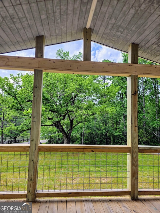 2859 Fortner Rd, Ball Ground, GA 30107 - wooden deck with a lawn and view of wooded area