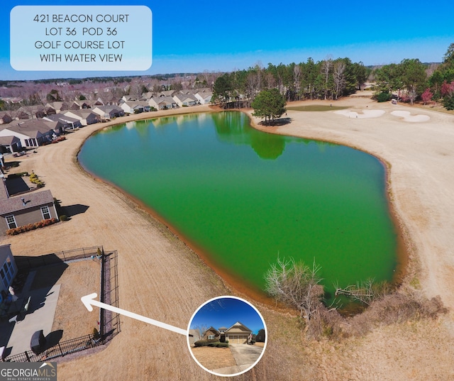 bird's eye view with a water view and a residential view