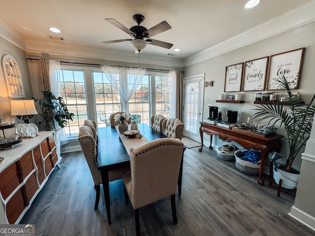 dining room with visible vents, a ceiling fan, dark wood-style flooring, crown molding, and recessed lighting