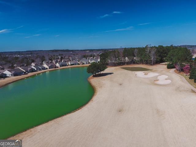 bird's eye view featuring a water view and a residential view