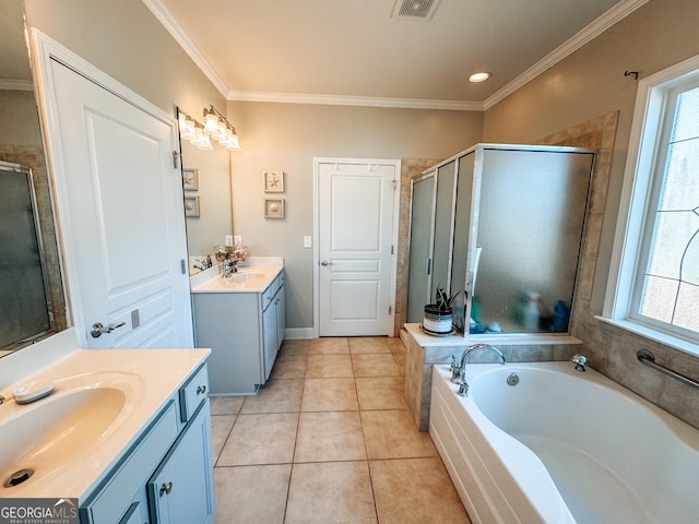 full bathroom with a shower stall, crown molding, a sink, and tile patterned floors