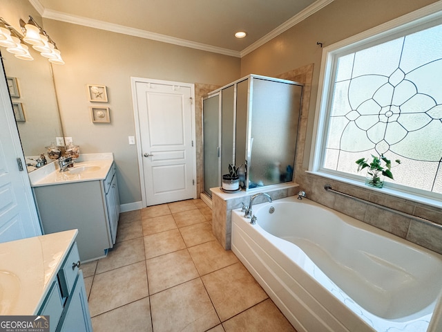 full bathroom featuring a stall shower, tile patterned floors, crown molding, and vanity