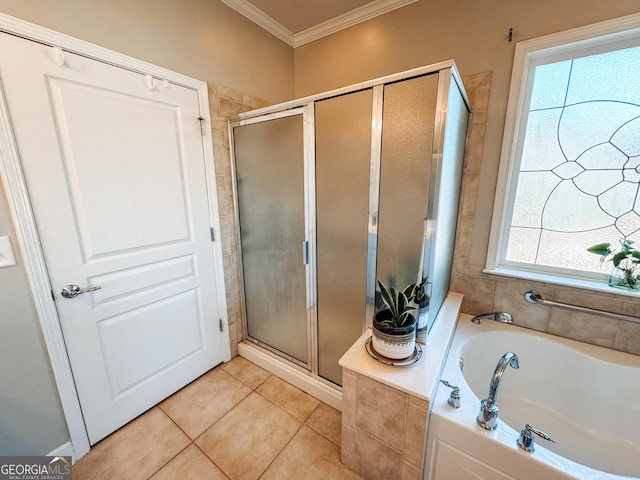 full bath featuring a shower stall, ornamental molding, a wealth of natural light, and tile patterned floors