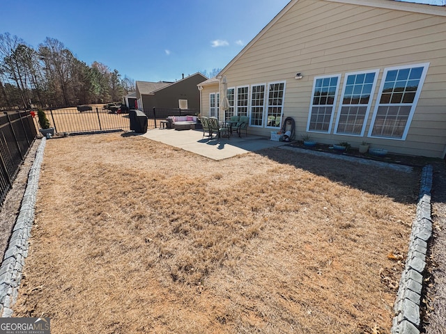 view of yard featuring a fenced backyard and a patio