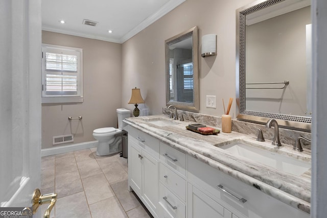 bathroom featuring toilet, visible vents, a sink, and ornamental molding