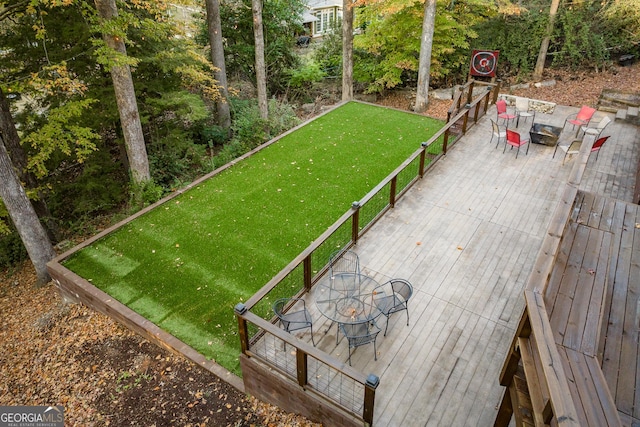 exterior space with an outdoor fire pit