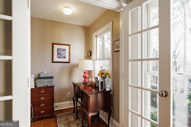 office area featuring dark wood finished floors and baseboards