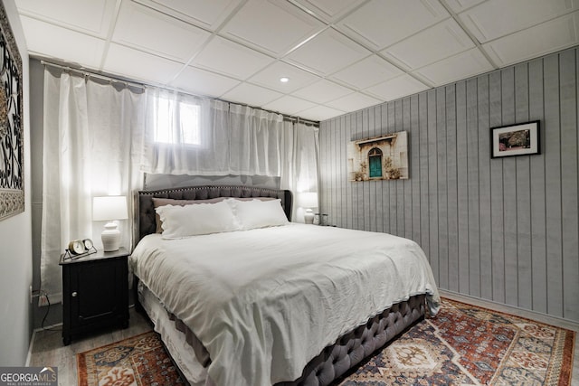 bedroom with wood finished floors