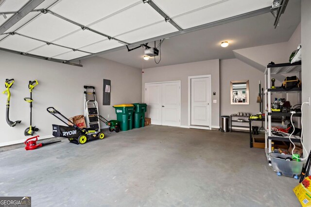 garage featuring a garage door opener