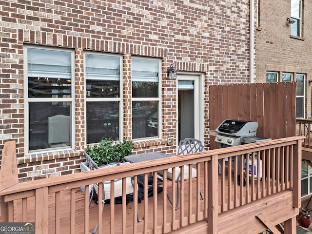 deck featuring grilling area