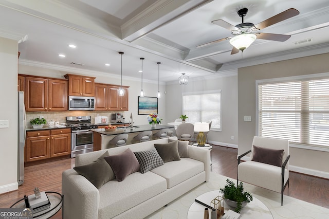 2275 W Village Ln SE, Smyrna, GA 30080 - living area with a ceiling fan, recessed lighting, wood finished floors, beamed ceiling, and ornamental molding