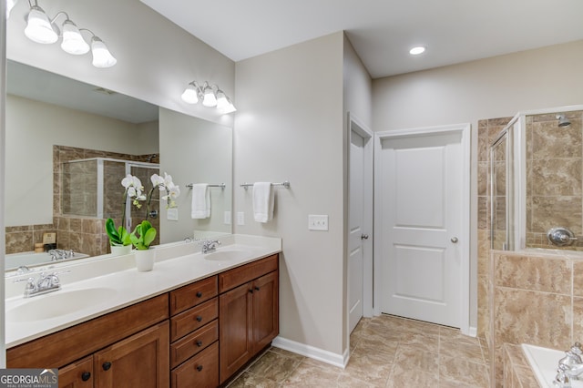 2275 W Village Ln SE, Smyrna, GA 30080 - bathroom featuring double vanity, a sink, a bath, and a stall shower