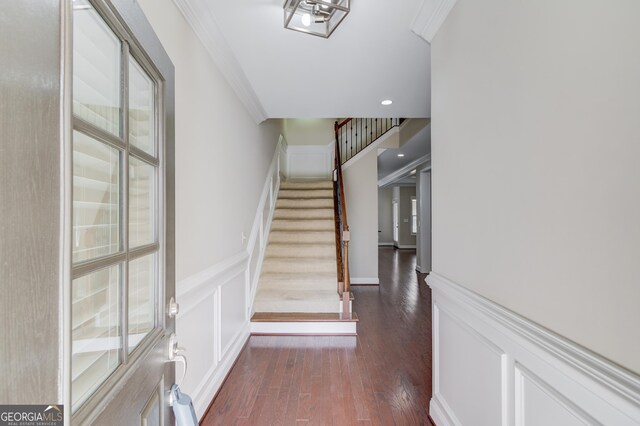 2275 W Village Ln SE, Smyrna, GA 30080 - foyer entrance featuring crown molding, a wainscoted wall, stairs, and wood finished floors