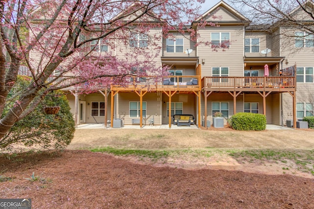 2275 W Village Ln SE, Smyrna, GA 30080 - rear view of property with central air condition unit