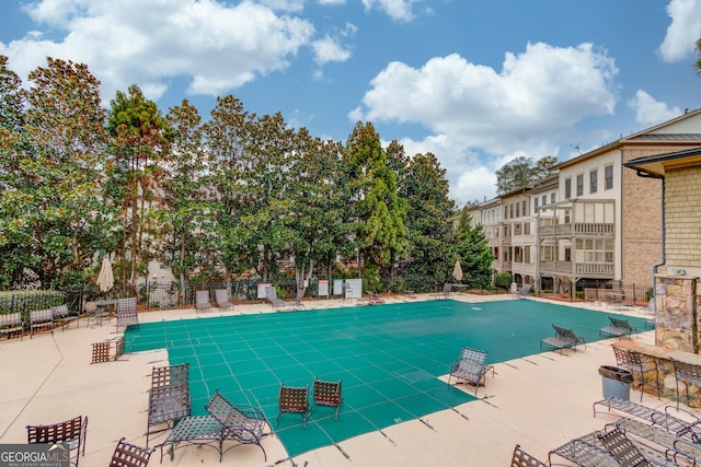 2275 W Village Ln SE, Smyrna, GA 30080 - community pool featuring fence and a patio