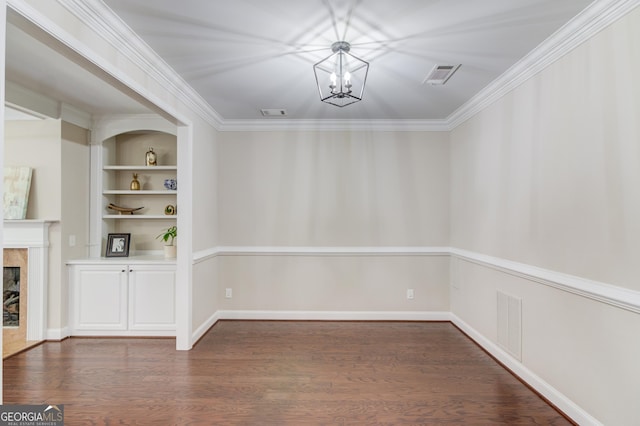 2275 W Village Ln SE, Smyrna, GA 30080 - unfurnished dining area featuring visible vents, wood finished floors, a chandelier, and a premium fireplace