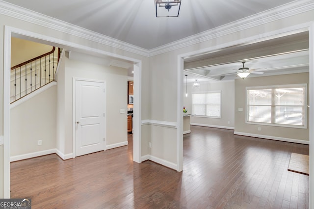 2275 W Village Ln SE, Smyrna, GA 30080 - interior space featuring crown molding, stairs, baseboards, dark wood-type flooring, and a ceiling fan
