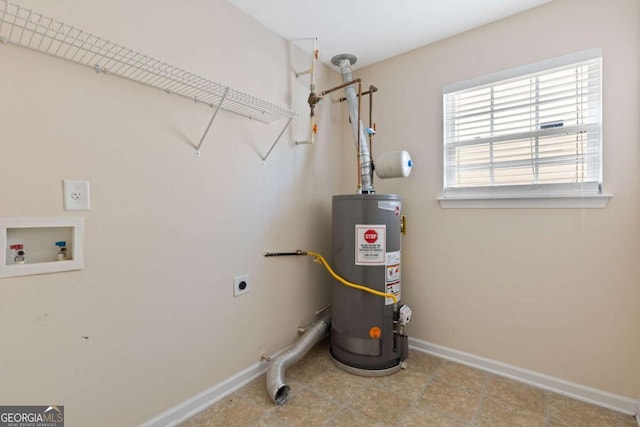 utility room featuring water heater
