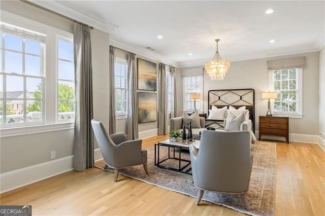 bedroom with a notable chandelier, recessed lighting, wood finished floors, baseboards, and ornamental molding