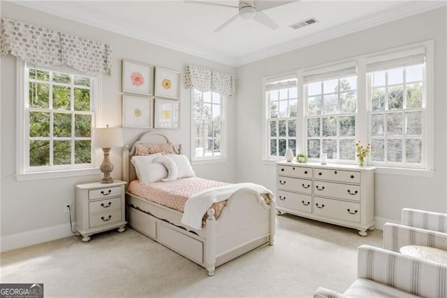 bedroom featuring light carpet, baseboards, visible vents, ceiling fan, and ornamental molding