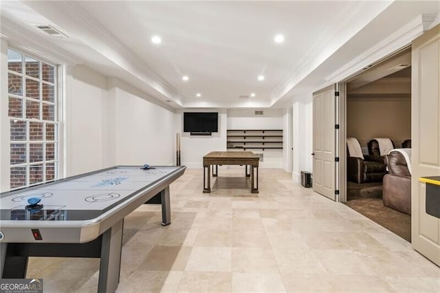 playroom featuring ornamental molding, recessed lighting, a raised ceiling, and visible vents