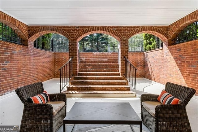 view of patio / terrace featuring fence