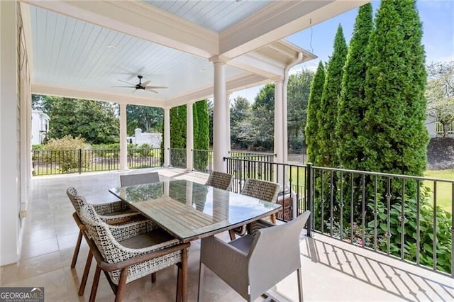 view of patio / terrace with outdoor dining area and ceiling fan