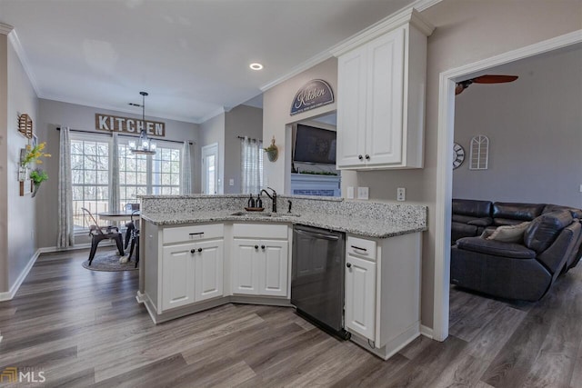 kitchen with dark wood-type flooring, white cabinets, dishwasher, and a sink